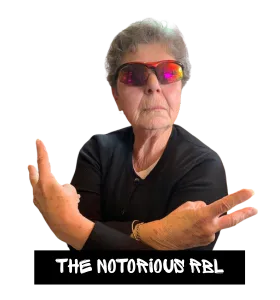 The Notorious RBL in mirrored sunglasses, arms crossed